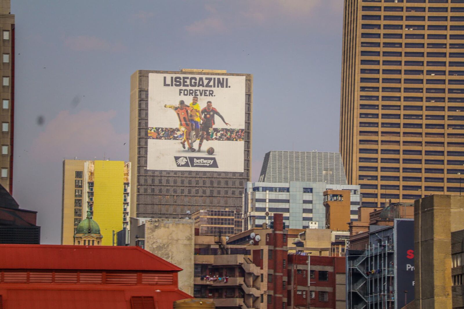 Betway Premiership building wrap printed and installed on a city high rise