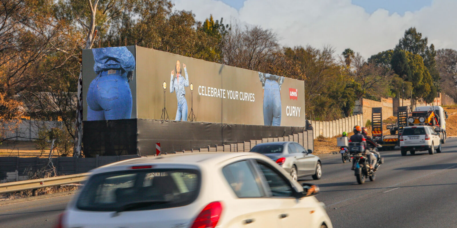 Large Levi's Curvy wall banner printed and tensioned on a roadside frame